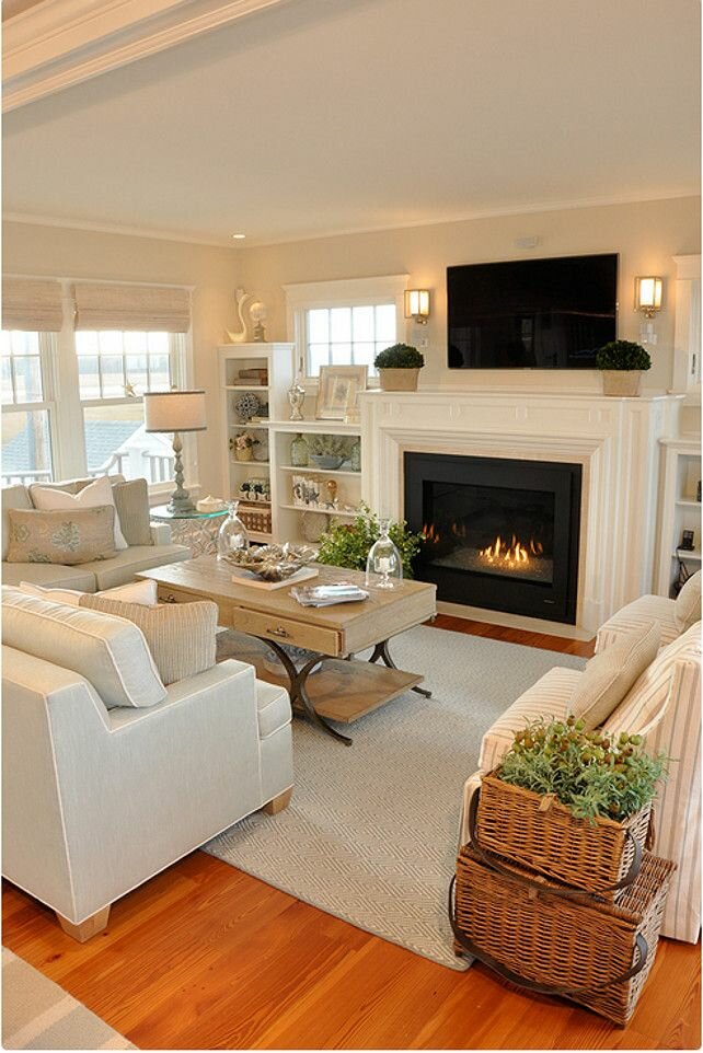 cosy white living room with fireplace