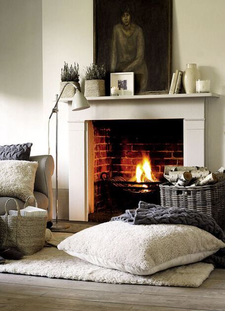 interior design with fireplace and pillows