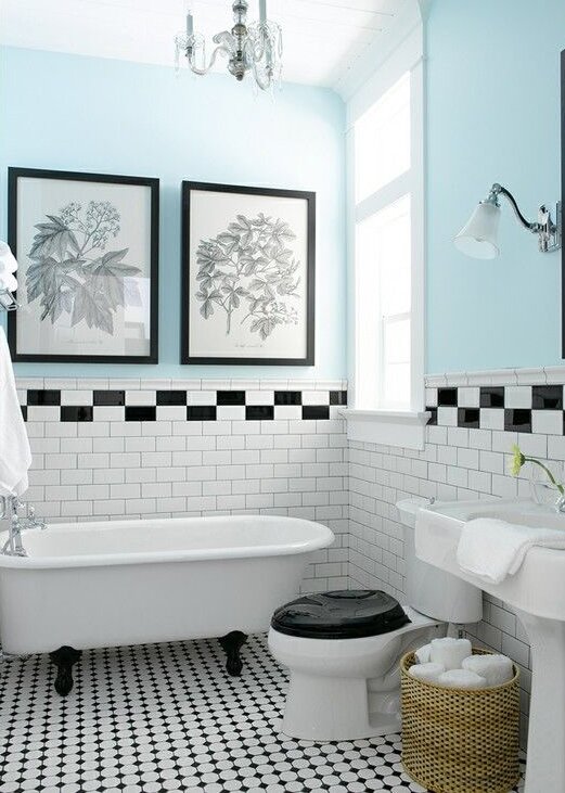 blue bathroom design with pedestal tub