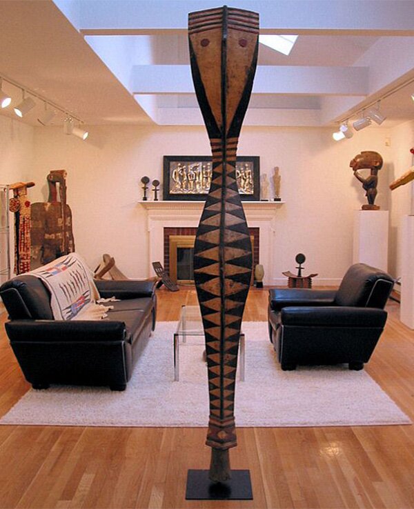 Stylish living room decor with creative sculpture