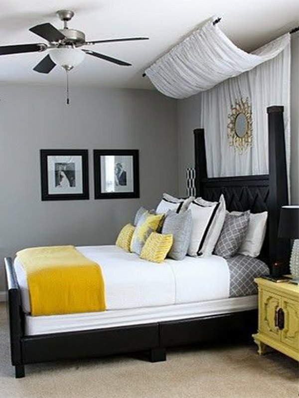 romantic bedroom with yellow bedspread