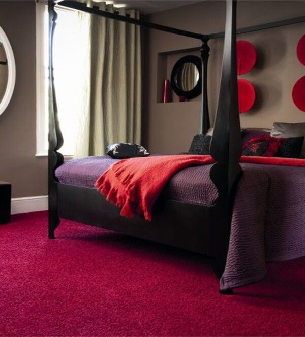 romantic couple bedroom with red tones